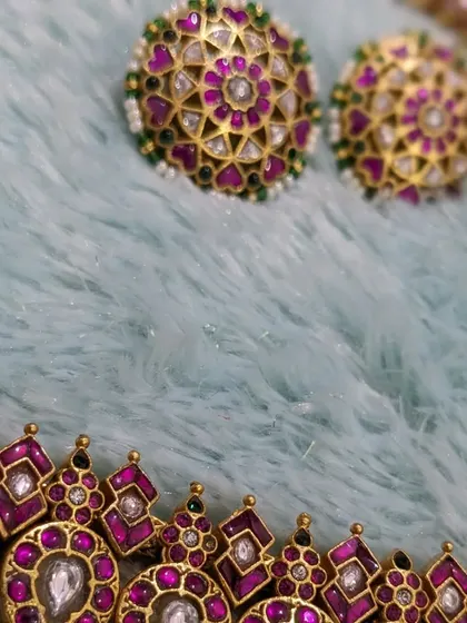 A close-up of the matching Jadau stud earrings, which are versatile enough to be worn on their own.