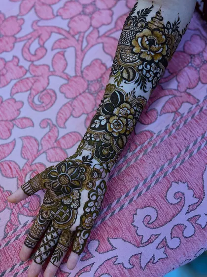A single arm view of the designer floral piece, showing the combination of bold flowers and negative space for a modern feel.