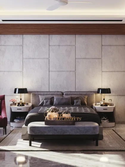 A contemporary bedroom with a bold, textured headboard wall, dark grey tones, and a pop of color from the armchair, creating a moody and sophisticated vibe.