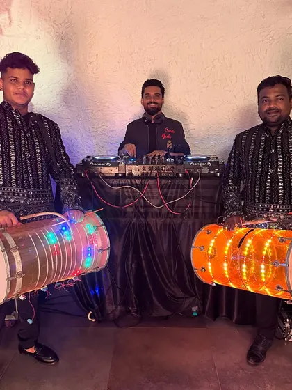 For a truly authentic desi wedding or sangeet, I collaborate with live dhol players. This fusion of my DJ set with live dhol beats creates an electrifying atmosphere for the baraat or dance floor.