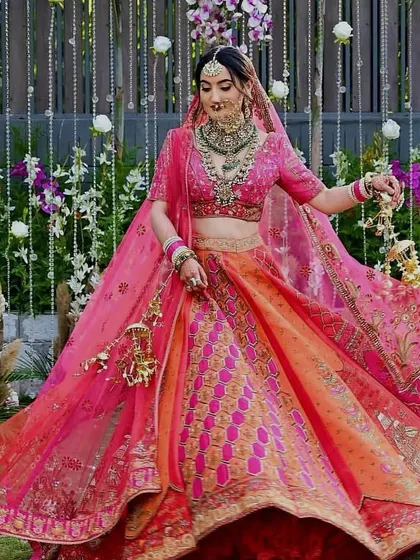 A bride in motion, her colorful lehenga adding to the beauty of the dance. We consider every visual element when planning your performance.