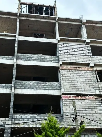 A view of the upper floors under construction for the Hosa Road project. You can see the spaces for large windows being framed, which will eventually allow for ample natural light in the future offices.