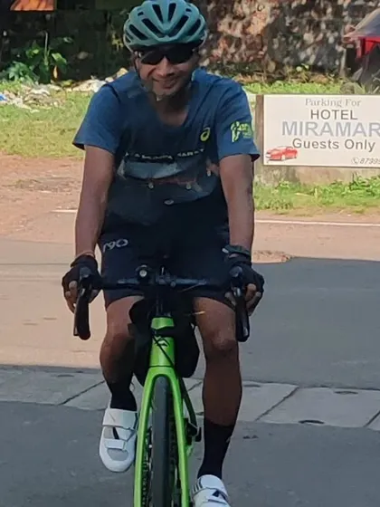 Pravin in action during the cycling leg of the Ironman. His journey is an inspiration to all of us.