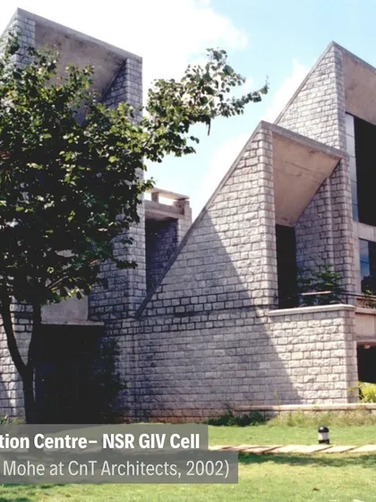 The Incubation Centre - NSR GIV Cell (2002), an early intervention at IIM-B featuring a distinctive, angular form clad in the campus's signature stone.