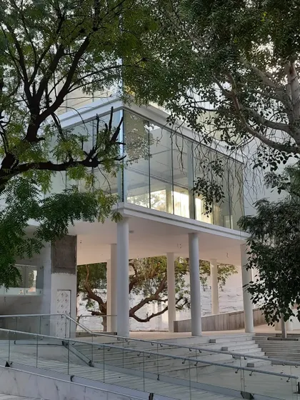 Glimpses of our ongoing project for the Koba Jain Museum. The pristine white structure is lifted on stilts and nestled among existing trees, creating a serene pavilion that invites community interaction and feels light upon the earth.