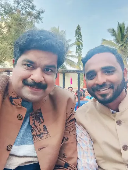 A selfie with Mohan, a talented folk singer from the movie 'Vedha', at an event in Jigani. It's great to meet artists from different fields.