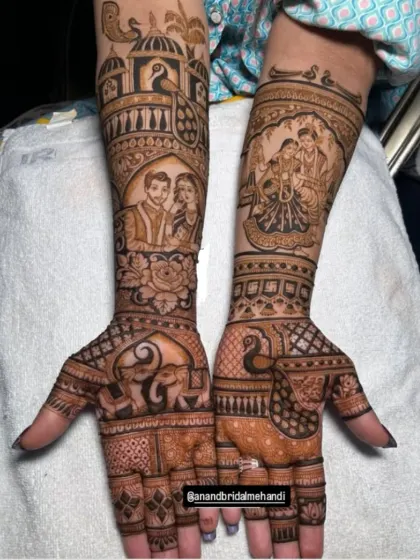 This custom design features a couple's portrait, Radha-Krishna, and traditional elephant and peacock motifs.