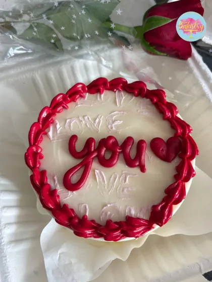 A classic "love you" bento cake with a red heart border, another one of my special treats for Valentine's Day.