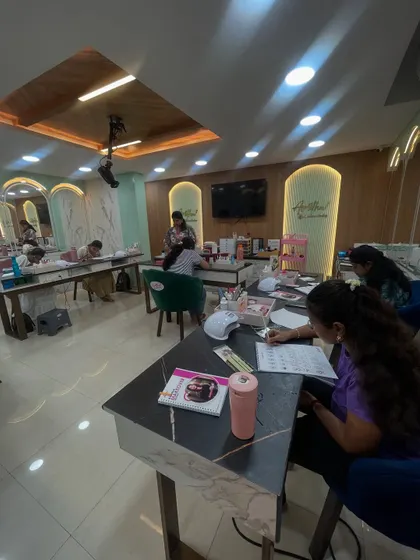 A wide view of our dedicated nail art classroom, fully equipped with all the tools and products students need.