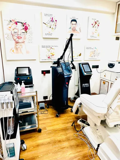 Here you can see a corner of my treatment room, featuring some of my advanced laser equipment. My practice is built on a foundation of trust and expertise, ensuring every procedure is performed with the highest standard of medical care.