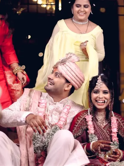 The whole family gets involved in the fun of the joota churai, and we're there to capture all the laughter.