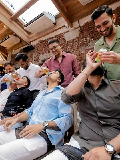 A closer look at the hilarious baby bottle drinking race.