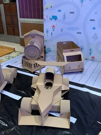 Here you can see a Formula 1 race car, a steam engine, and a dump truck ready for action. Offering a variety of vehicle types ensures there's something exciting for every little guest to paint and play with.