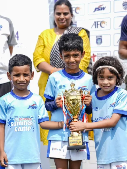 Our youngest players proudly hold their runners-up trophy from the BFC AIFF Blue Cubs league. Every tournament is a valuable learning experience.