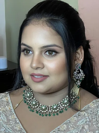 This profile view highlights the flawless contouring and highlighting. My course covers facial anatomy to teach you how to sculpt and enhance features for a photo-ready finish.