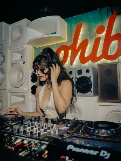 A focused shot of me working the Pioneer DJ mixer during my set in Goa.