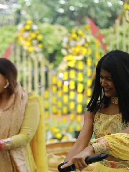 Enjoying the moment with guests at a Haldi ceremony.