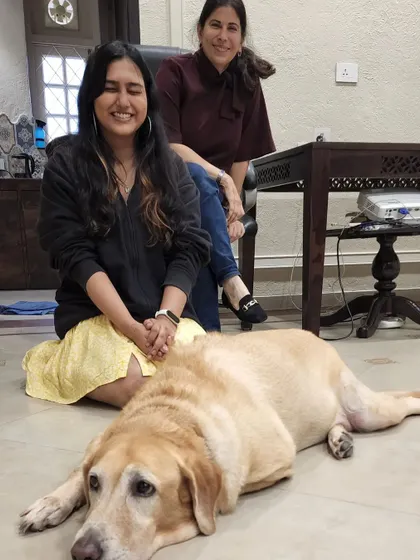 Learning from pioneers in the field is a privilege. Here I am with my mentor, Shirin Merchant, and one of the resident dogs during my certification course. My education is grounded in understanding canine behavior deeply, not just giving commands.