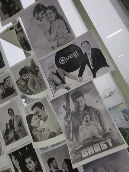 A close-up of some of the sketches on my art wall, including the 'Ghost' poster and a corporate piece for Quest.