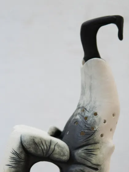 This powerful sculpture, "The Arm of a Western Hoolock Gibbon," was created by one of our foundation students. It tells the tragic true story of Kalia, the Lost Gibbon of Assam, and stands as a statement on ecosystem loss and animal abuse.