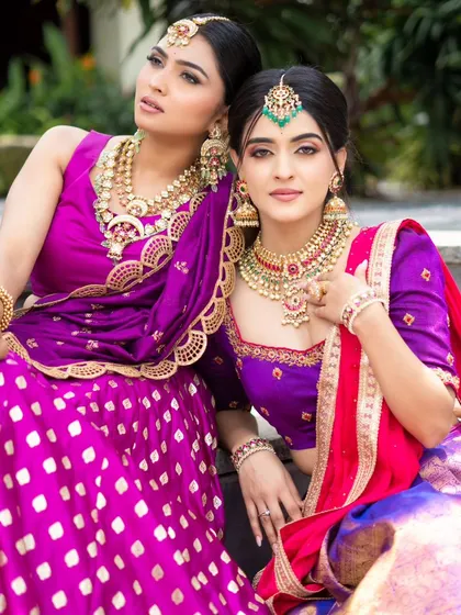 A closer look at our coordinated styling. We carefully select jewelry and color palettes that complement each other while allowing each individual's look to shine.