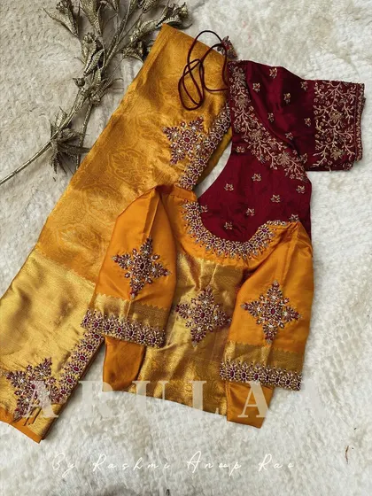 A stunning bridal set featuring two blouses for one saree. This mustard yellow blouse has heavy kundan and zardosi work, perfect for the main ceremony.