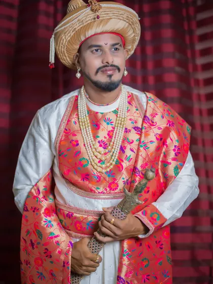 Another powerful portrait of the groom in his historical-themed attire, looking confident and majestic.