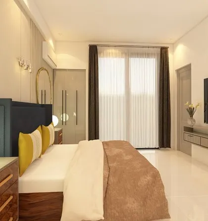 The same room, now showing the effect of bright, white light, which makes the space feel fresh and airy. The TV unit is kept sleek and minimal.