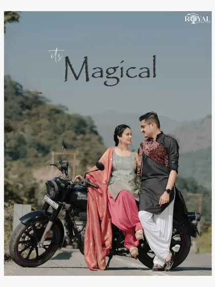 A beautiful portrait of a couple in traditional attire with their bike, captioned 'It's Magical', highlighting a unique theme combination.