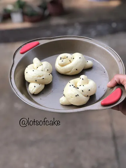 Here are some dinner rolls shaped and ready for the oven. In my bread making session, you will learn how to knead, prove, and shape dough for soft, fluffy rolls.