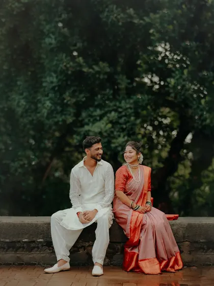 A quiet moment of conversation between the newly engaged couple. This candid shot captures their easy comfort and happiness with each other.