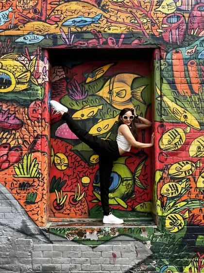 Another angle of my practice against the colorful graffiti in Toronto. Finding art and inspiration in urban environments is just as beautiful as in nature.