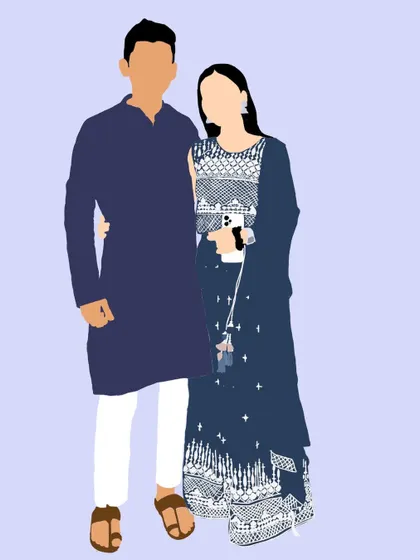 An elegant faceless portrait of a couple in coordinated blue traditional outfits.
