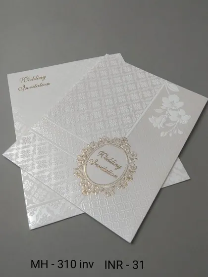 This simple white invitation has a textured background and a classic gold emblem. It's a clean and budget-friendly choice for a formal announcement.