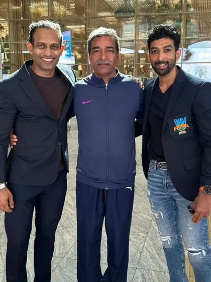 At the airport with my dad and teammate, off to represent India at the World Championships.