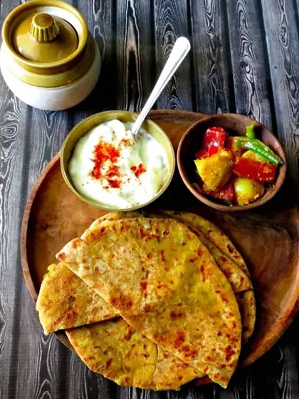 Our winter special Stuffed Parantha, served with yogurt and pickle. A hearty and satisfying breakfast to keep you warm.