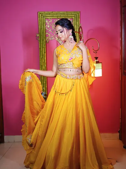 Another full-length shot of the yellow Haldi lehenga, a perfect choice for a vibrant and happy celebration.