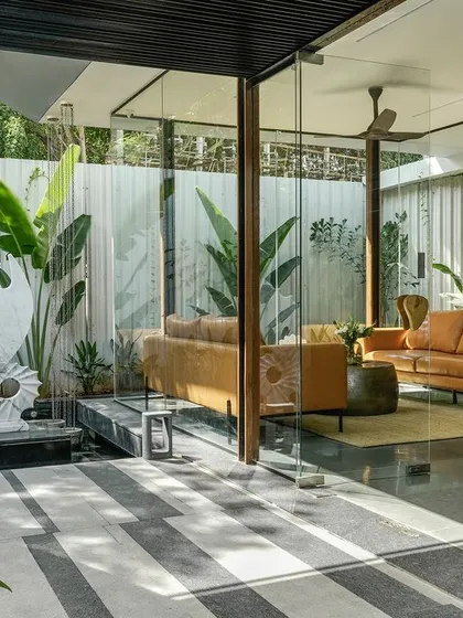 Our design philosophy blurs the line between indoors and outdoors. In this reception area for the Soul Spring project, floor-to-ceiling glass and an integrated water body invite the landscape inside, creating a tranquil and welcoming atmosphere from the moment of arrival.