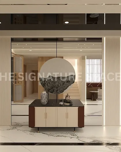 This foyer features a statement console against a backdrop of mirrored and fluted panels. We managed the complete installation, ensuring the vertical lighting strips were perfectly integrated for a dramatic entrance.