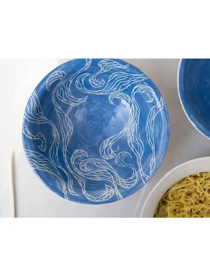 These tastefully made ramen bowls were created by our Foundation students. They are beautifully decorated with detailed sgraffito work inspired by Japanese patterns, landscapes, and culture, turning a functional item into a piece of art.