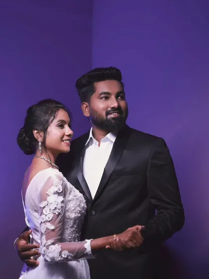 The groom's modern hairstyle and clean look are perfect for this contemporary Christian wedding style.