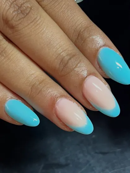 A clean and simple blue French manicure. A modern classic.
