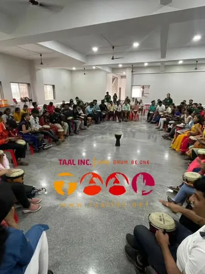 A high-angle shot of our session with the Robin Hood Army. You can see the scale of the group and the focus of the participants, all connected by the rhythm we are creating together.