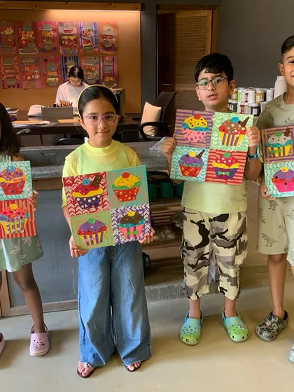 Another group of students with their fantastic cupcake pop art pieces.