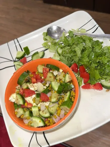 A fresh and crunchy salad with moong sprouts, cucumber, tomato, and paneer. A perfect light and nutritious meal.