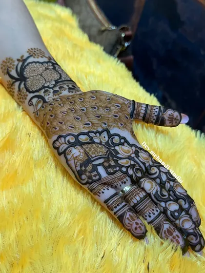 A detailed design featuring an elephant, symbolizing strength and good luck, incorporated into a traditional pattern.