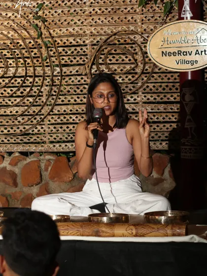 Leading a sound healing session at the Atmarpan Retreat, using my voice and instruments to guide participants toward inner peace.
