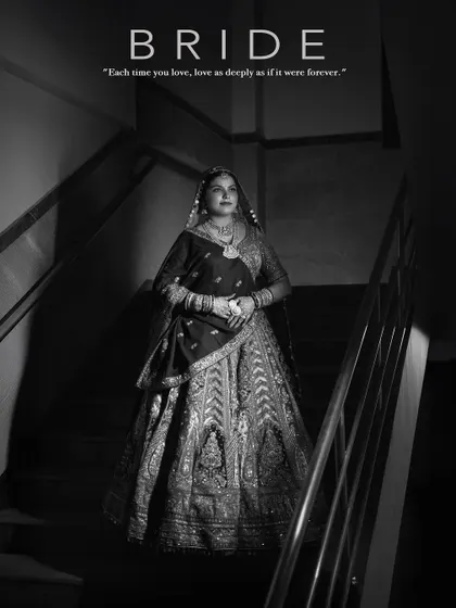 For me, bridal photography is a form of fashion portraiture. This black and white shot of a bride on a staircase uses shadow and light to create a timeless, cinematic feel. I focus on capturing the grandeur of the wedding lehenga and the quiet elegance of the moment before the ceremony.