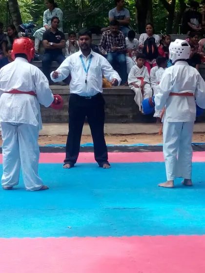 Action from a local Kyokushin tournament. I often serve as a referee, ensuring fights are conducted with respect and adherence to the rules of full-contact karate.