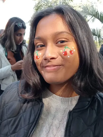 A fun and fruity design with cute red cherries painted on both cheeks. Perfect for a playful, summery vibe.